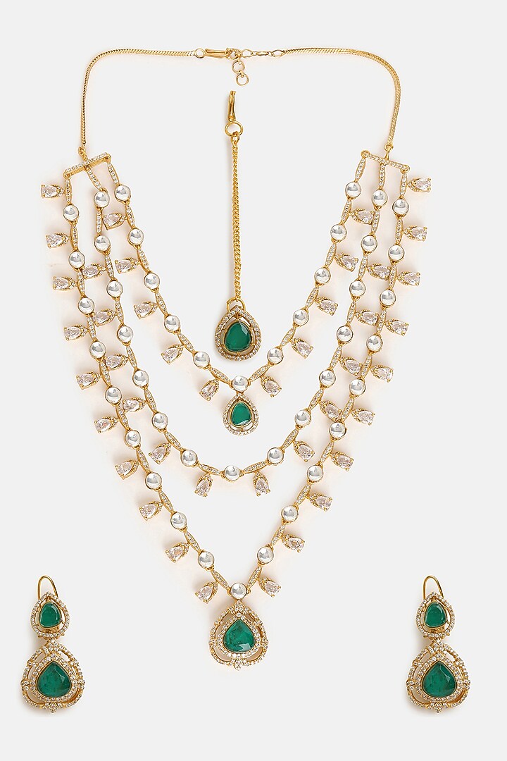 Gold Finish Moissanite & Emerald Stone Layered Necklace Set by Ruby Raang at Pernia's Pop Up Shop