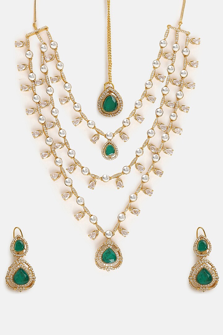 Gold Finish Moissanite & Emerald Stone Layered Necklace Set by Ruby Raang at Pernia's Pop Up Shop