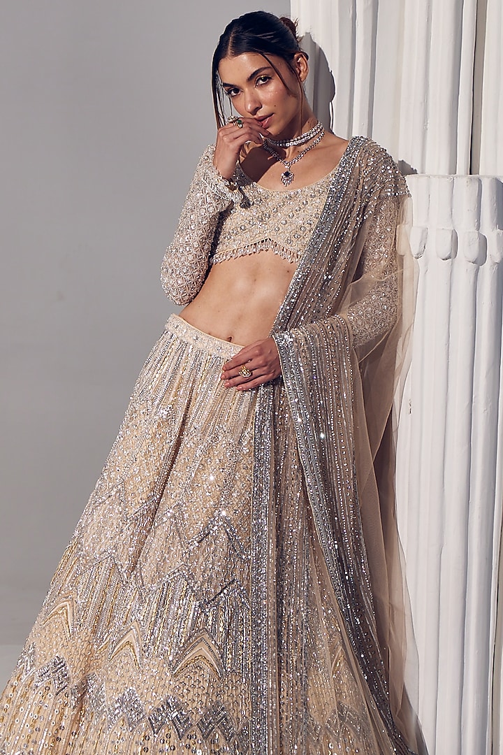 Ivory Net & Silk Embroidered Bridal Lehenga Set by Ruchika Hurria at Pernia's Pop Up Shop