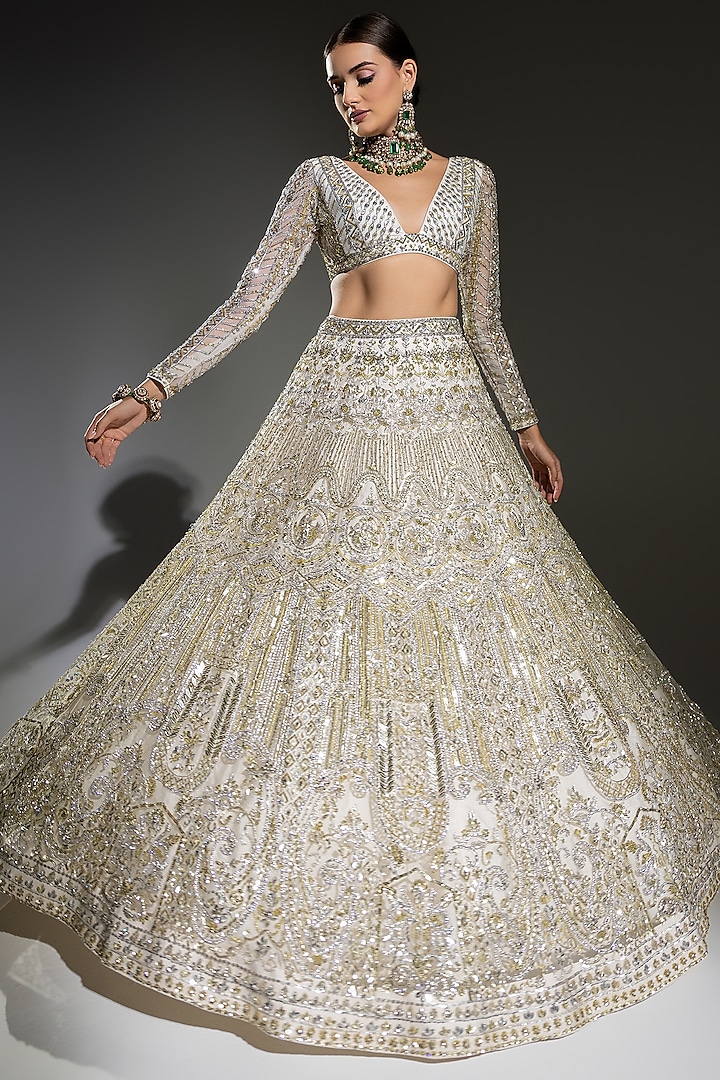 Ivory Net Sequins Embroidered Lehenga Set by Ruchika Hurria