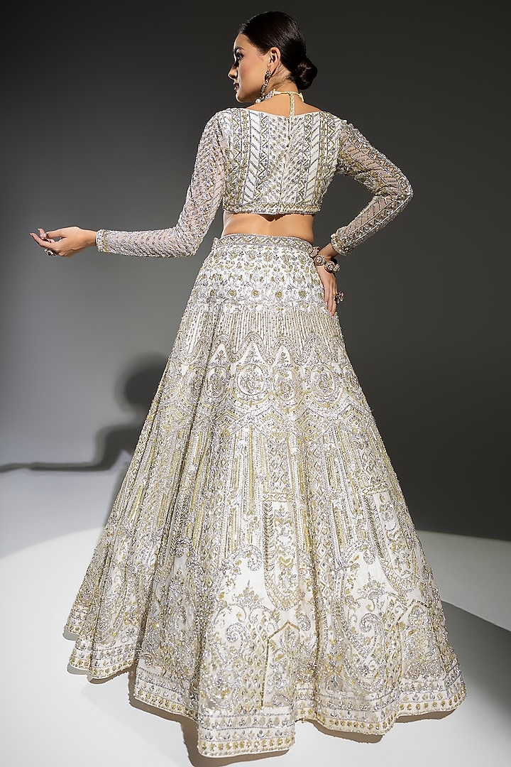 Ivory Net Sequins Embroidered Bridal Lehenga Set by Ruchika Hurria at Pernia's Pop Up Shop
