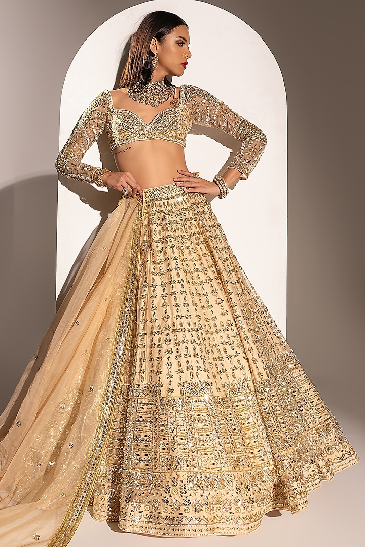 Peach Net Sequins Hand Embellished Lehenga Set by Ruchika Hurria