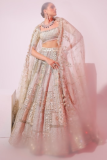 Ivory Raw Silk Sequins & Pearl Embroidered Bridal Lehenga Set by Ruchika Hurria at Pernia's Pop Up Shop