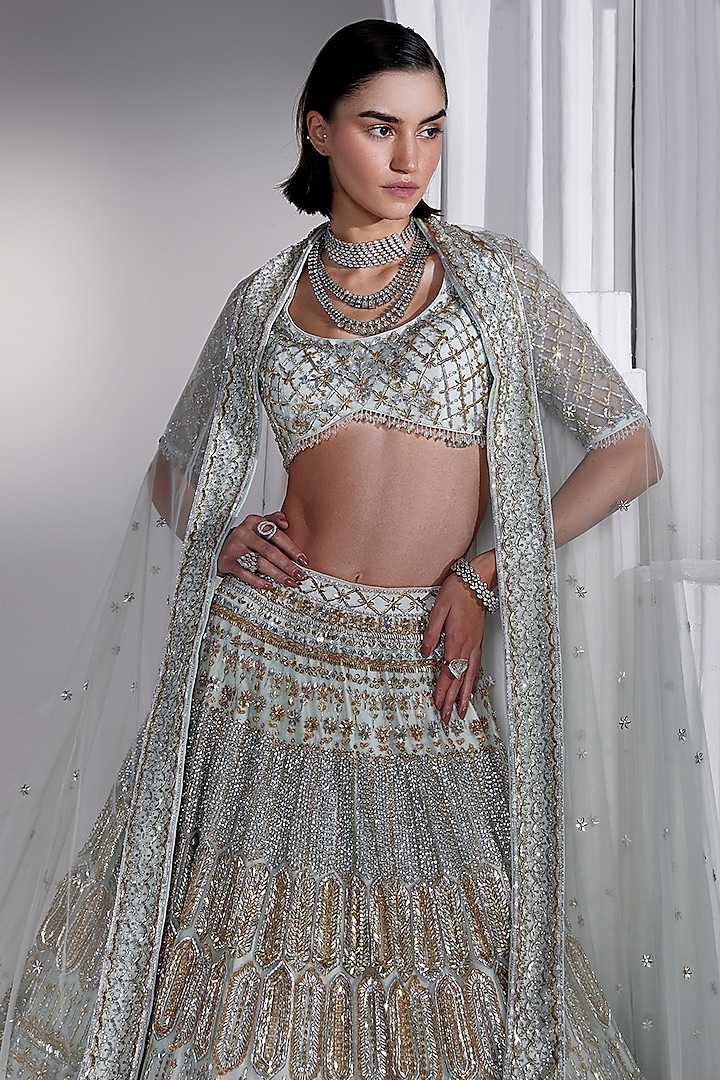 Ice Blue Net Nakshi & Crystal Embroidered Bridal Lehenga Set by Ruchika Hurria at Pernia's Pop Up Shop