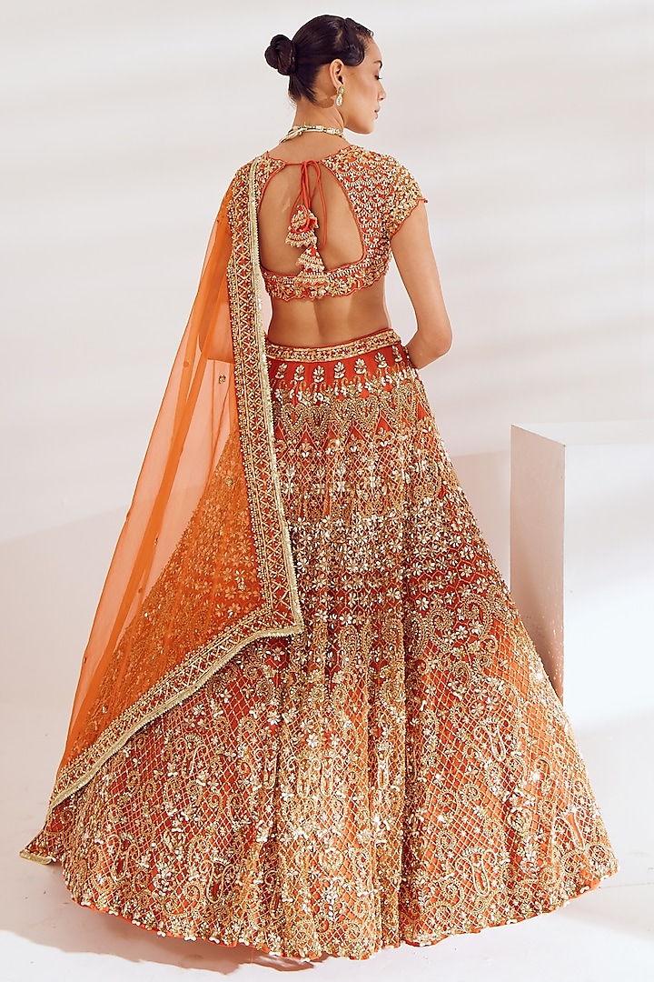 Burnt Orange Net Sequins Embroidered Bridal Lehenga Set by Ruchika Hurria at Pernia's Pop Up Shop