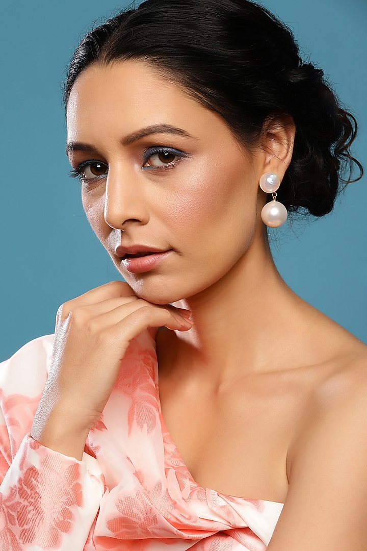 Gold Finish White Pearl Dangler Earrings by Ritu Singh