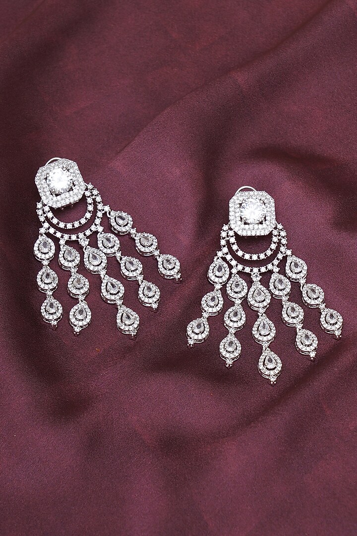 White Finish Zircon Dangler Earrings by Ritu Singh at Pernia's Pop Up Shop