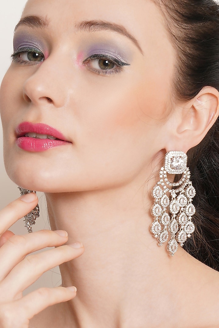 White Finish Zircon Dangler Earrings by Ritu Singh