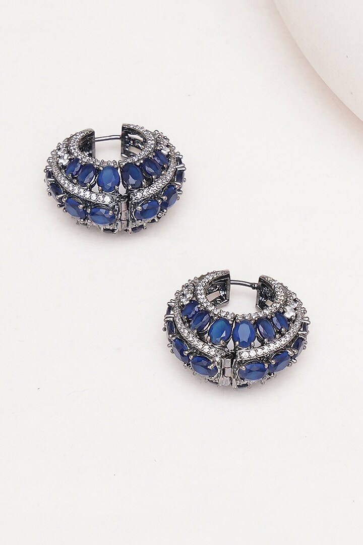 Black Rhodium Finish Blue Zircon Hoop Earrings by Ritu Singh at Pernia's Pop Up Shop