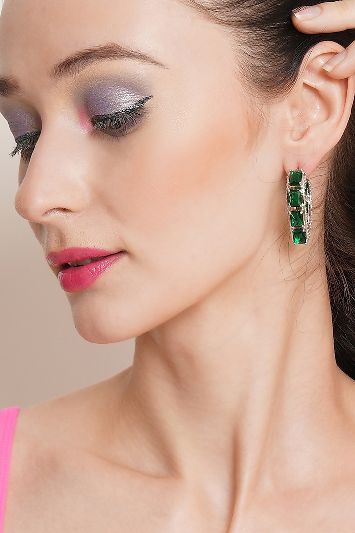 White Finish Emerald & Zircon Hoop Earrings by Ritu Singh
