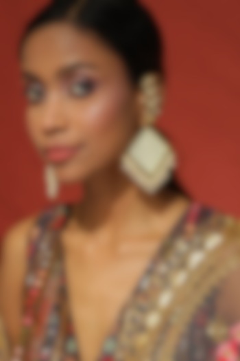 Gold Plated Dangler Earrings With Carved Beads by Ritu Singh