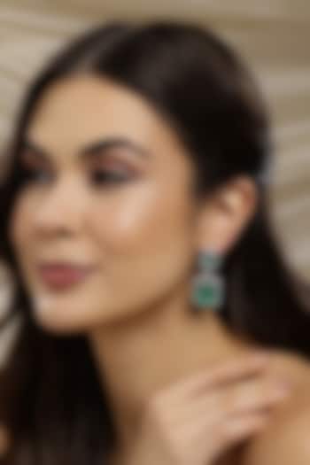 White Finish Green Zircon Dangler Earrings by Ritu Singh at Pernia's Pop Up Shop