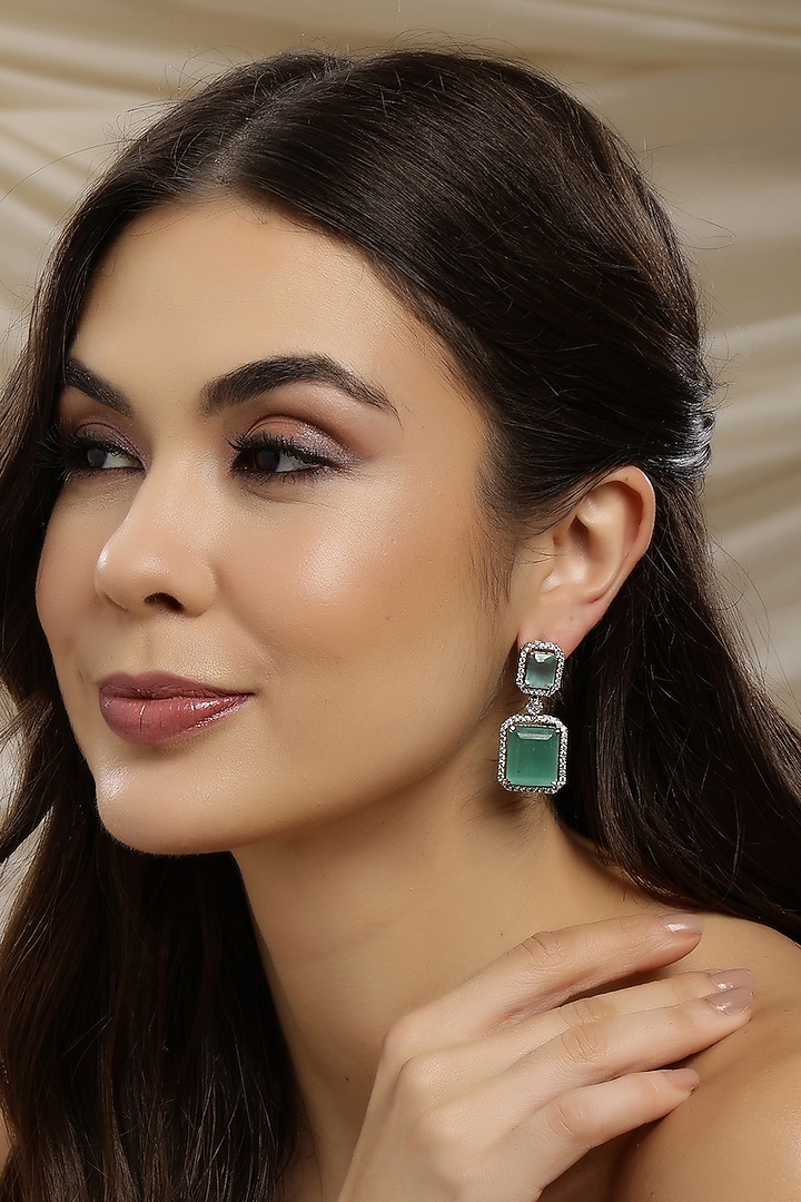 White Finish Green Zircon Dangler Earrings by Ritu Singh at Pernia's Pop Up Shop