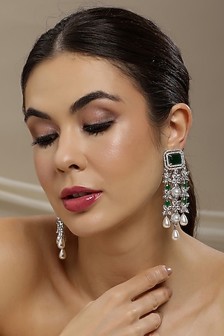 White Finish Emerald Stone & Zircon Dangler Earrings by Ritu Singh