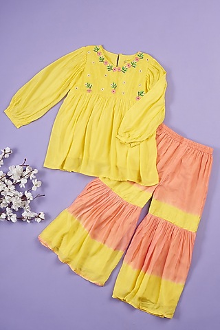 Yellow Muslin Sharara Set For Girls by Ruffle Buds