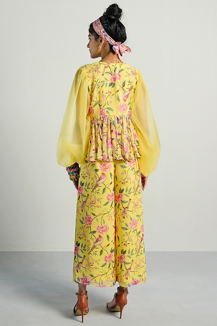Yellow Printed Peplum Top With Pants by Rishi & Vibhuti Pret at Pernia's Pop Up Shop