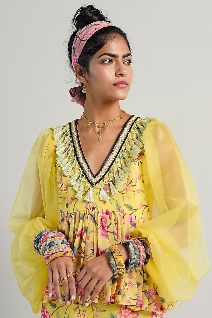 Yellow Printed Peplum Top With Pants by Rishi & Vibhuti Pret at Pernia's Pop Up Shop
