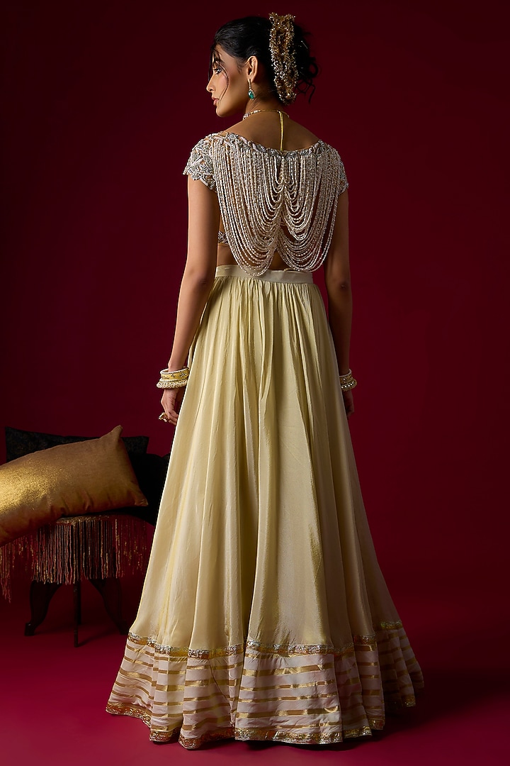 Gold Silk Tissue Wedding Lehenga Set by Rayasha Khan at Pernia's Pop Up Shop