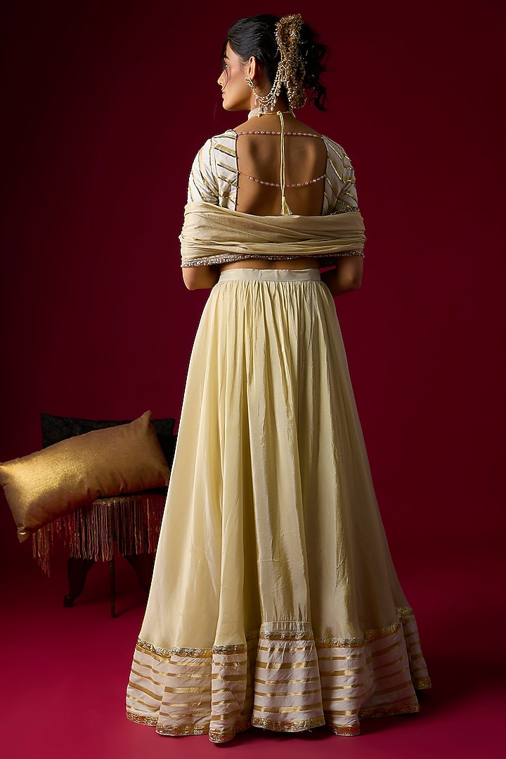 Gold Silk Tissue Lehenga Set by Rayasha Khan at Pernia's Pop Up Shop