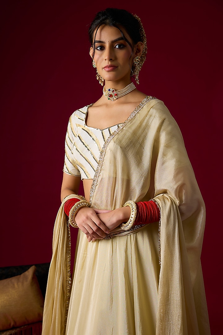 Gold Silk Tissue Lehenga Set by Rayasha Khan at Pernia's Pop Up Shop