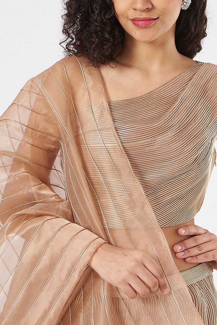 Rose Gold Hand Embroidered Bridal Lehenga Set by Rimzim Dadu at Pernia's Pop Up Shop