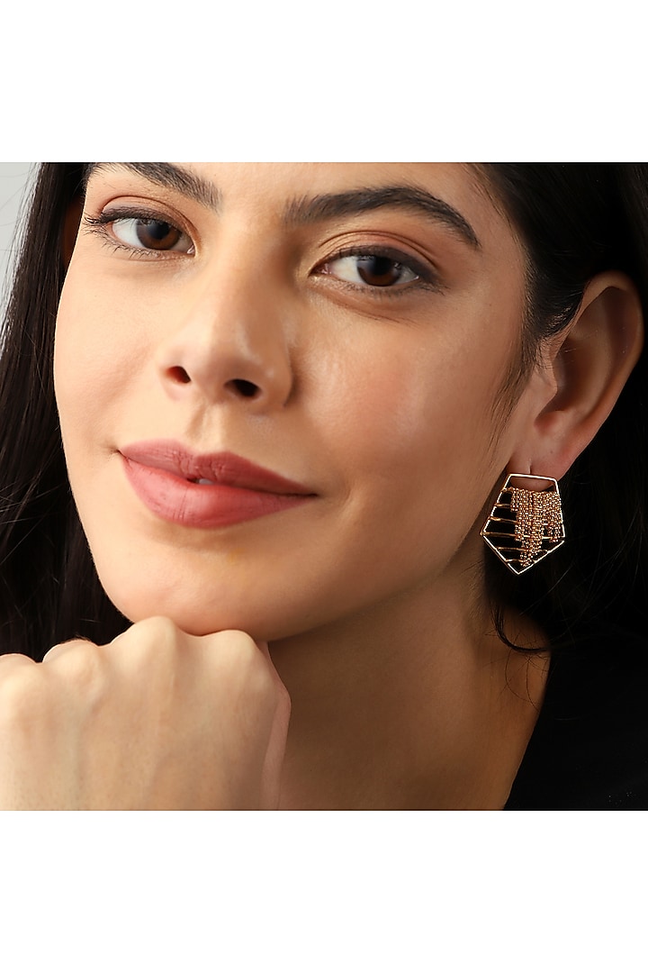 Gold Finish Pentagon Stud Earrings by Itrana By Sonal Gupta