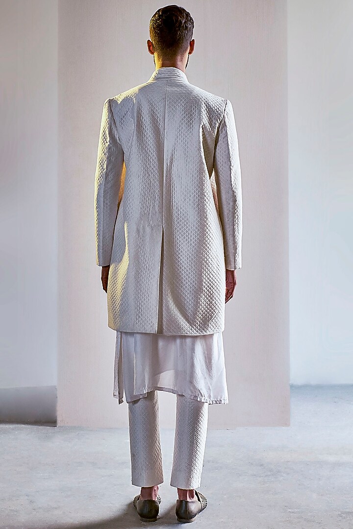 Ivory Handcrafted Long Bandhgala Jacket Set by Saksham and Neharicka Men at Pernia's Pop Up Shop