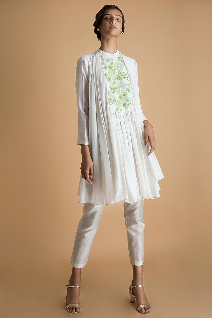 Ivory Hand Embroidered Flared Tunic by Saksham and Neharicka at Pernia's Pop Up Shop