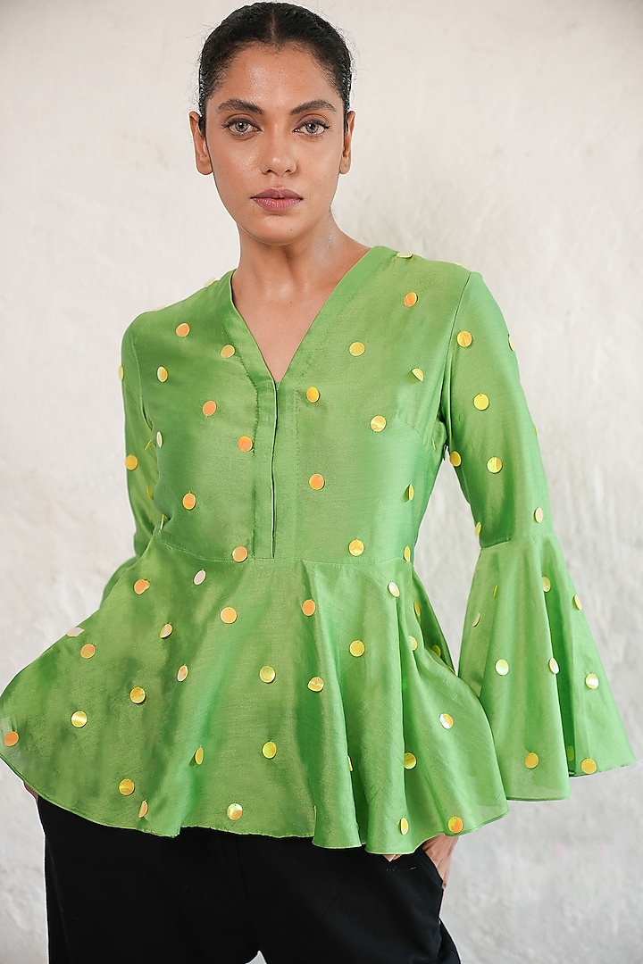 Green Banarasi Cotton Silk Sequins Embroidered Peplum Top by Saksham and Neharicka at Pernia's Pop Up Shop