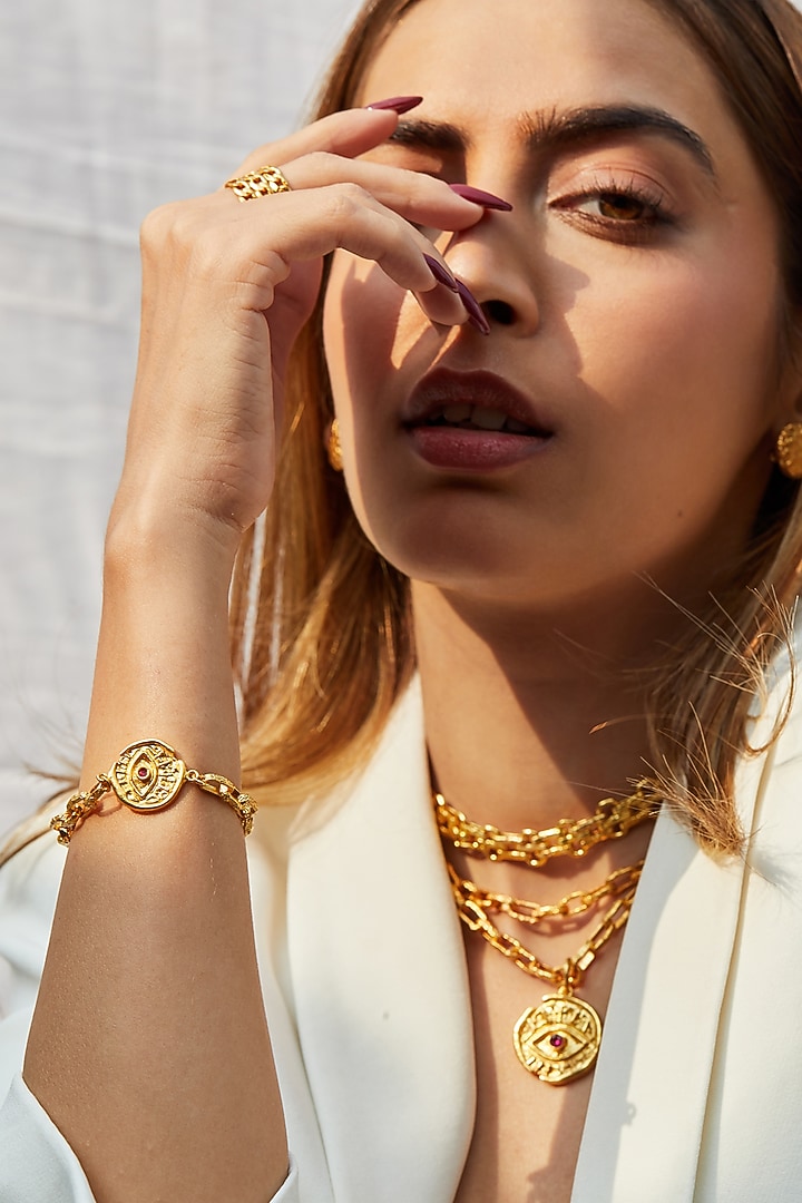 Gold Finish Evil Eye Bracelet by Flowerchild By Shaheen Abbas at Pernia's Pop Up Shop