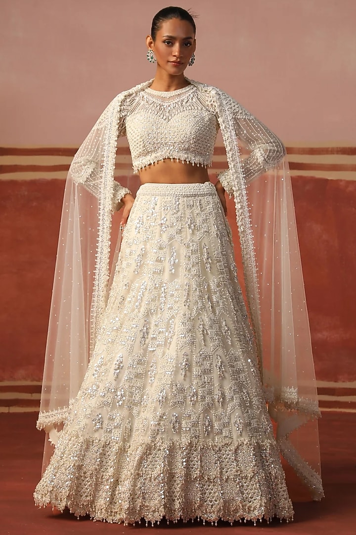 Ivory Net Sequin Embroidered Bridal Lehenga Set by SABE at Pernia's Pop Up Shop