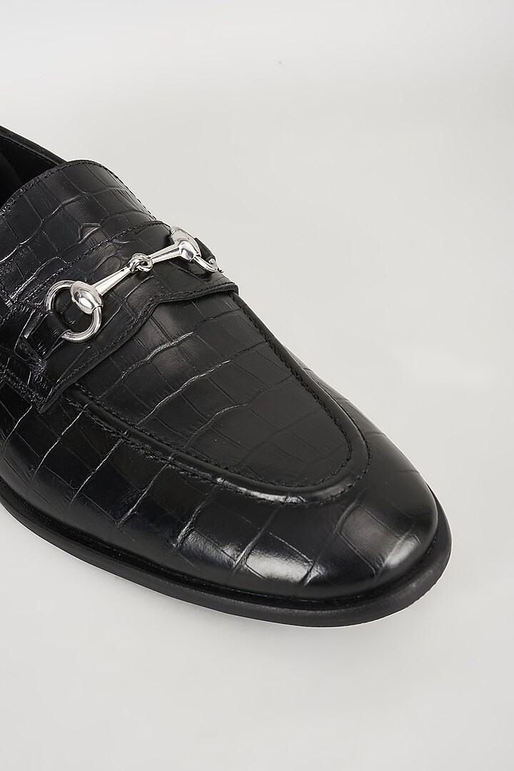 Black Embossed Leather Embellished Loafers by SALIL BHATIA at Pernia's Pop Up Shop