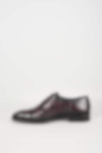 Wine Embossed Leather Monk Strap Shoes by SALIL BHATIA at Pernia's Pop Up Shop