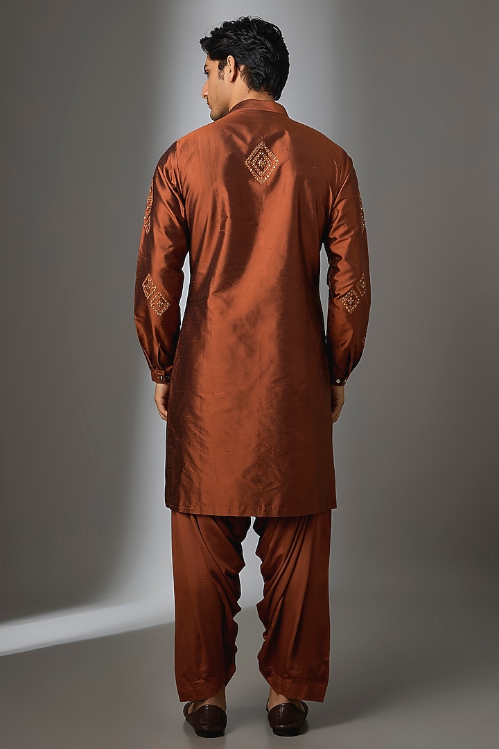 Rust Silk & Modal Satin Thread Embroidered Kurta Set by SALIL BHATIA at Pernia's Pop Up Shop
