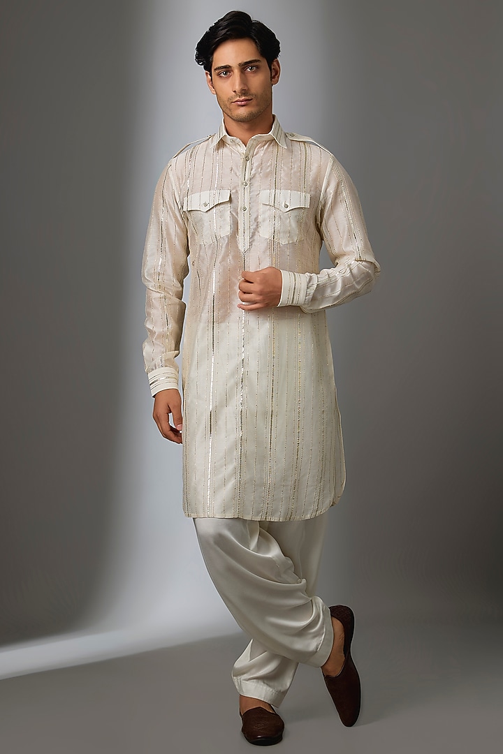 Ivory Chanderi & Modal Satin Embroidered Pathani Kurta Set by SALIL BHATIA at Pernia's Pop Up Shop