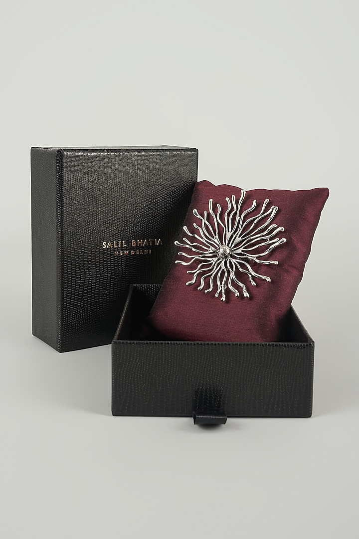 Silver Finish Embellished Floral Burst Brooch by SALIL BHATIA at Pernia's Pop Up Shop