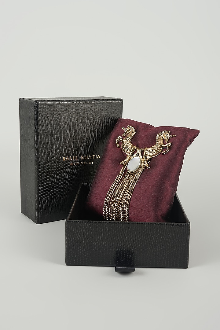 Gold Finish Embellished Unicorn Crest Brooch by SALIL BHATIA at Pernia's Pop Up Shop