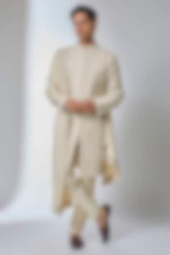 Beige Raw Silk Hand Embroidered Groom Sherwani Set by SALIL BHATIA at Pernia's Pop Up Shop