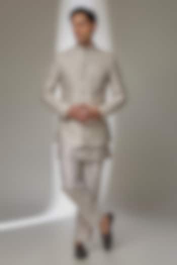 Oyster Beige Dola Silk Zari Embroidered Wedding Bandhgala Set by SALIL BHATIA at Pernia's Pop Up Shop