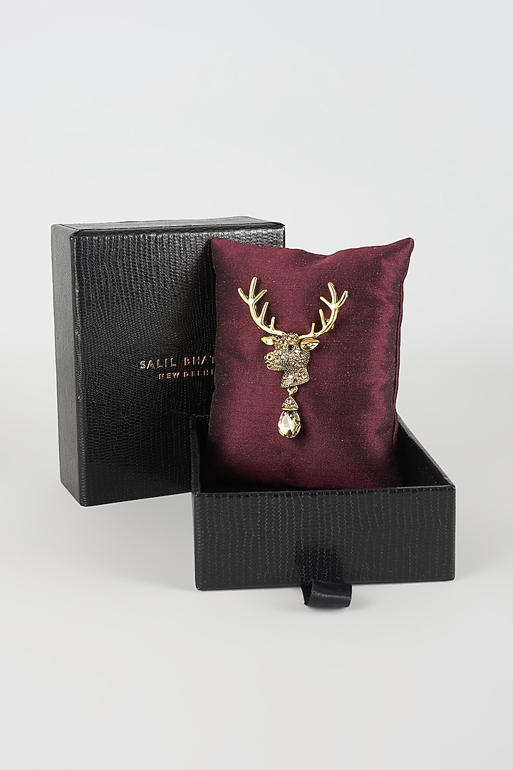 Gold Finish Reindeer Crest Embellished Brooch by SALIL BHATIA at Pernia's Pop Up Shop