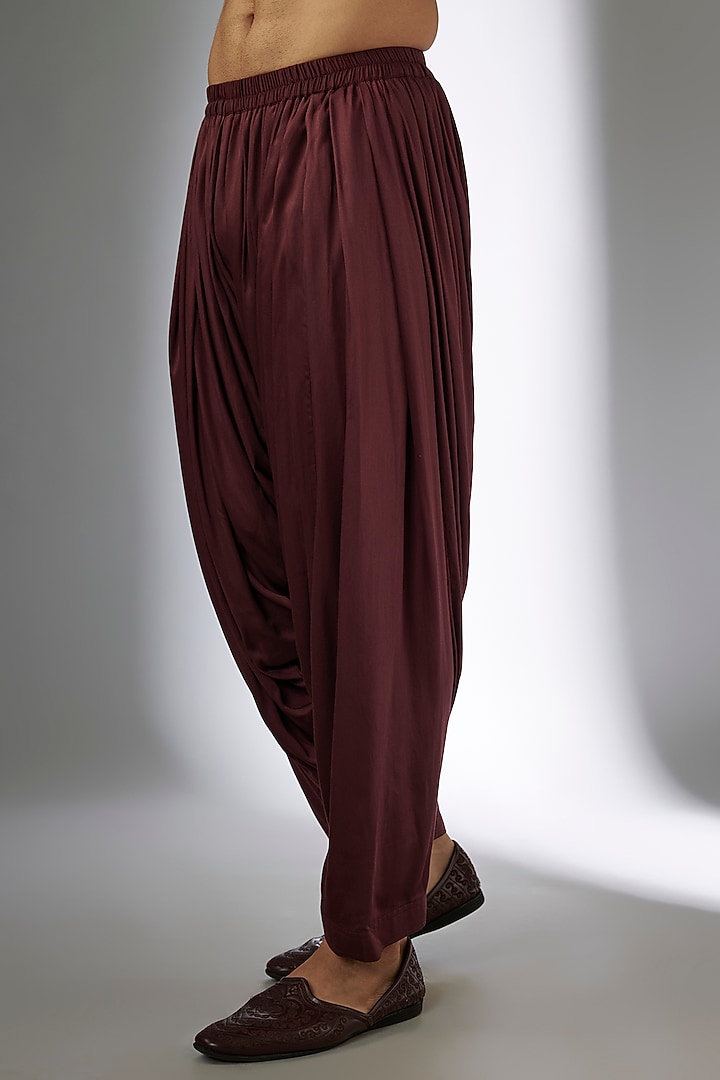 Wine Modal Satin Cowl Salwar Pants by SALIL BHATIA at Pernia's Pop Up Shop