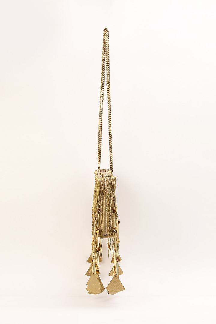 Gold Leather Tasselled Bag by Studio Accessories at Pernia's Pop Up Shop