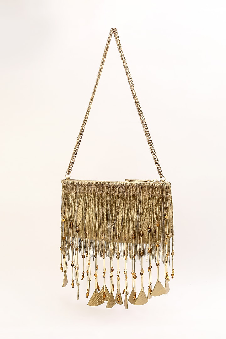 Gold Leather Tasselled Bag by Studio Accessories at Pernia's Pop Up Shop