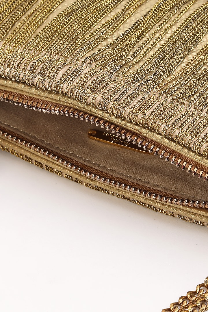 Gold Leather Tasselled Bag by Studio Accessories at Pernia's Pop Up Shop