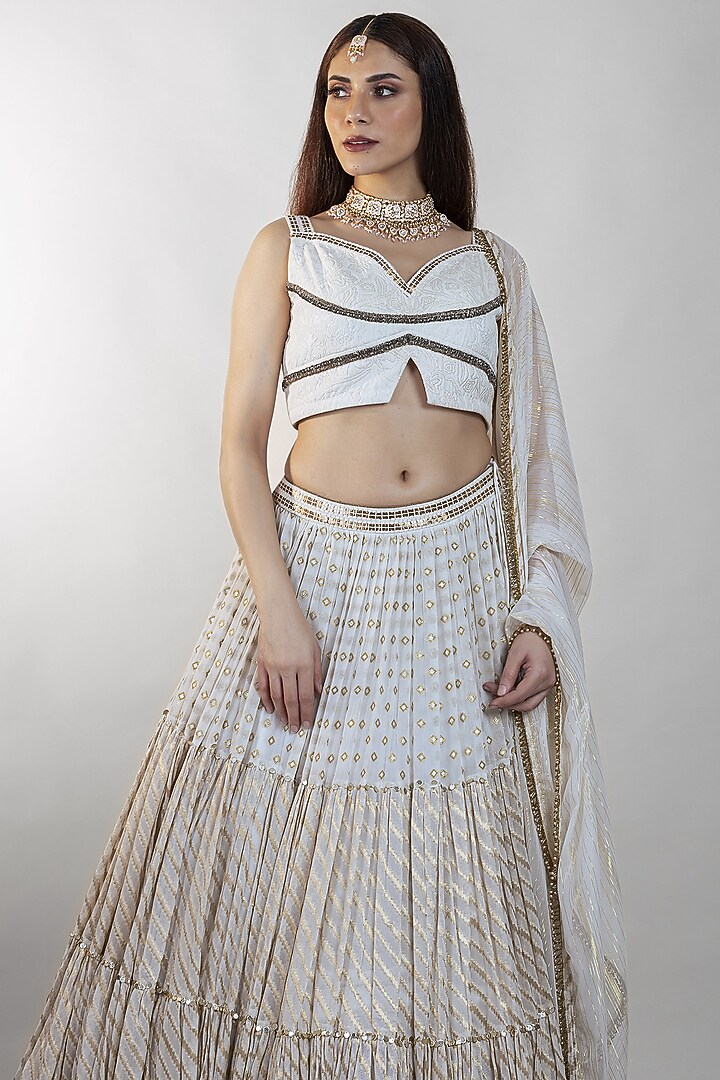 Off-White Embroidered Wedding Lehenga Set by Sadhvi Dang at Pernia's Pop Up Shop