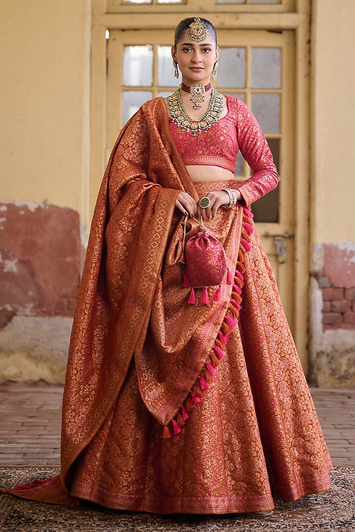 Orange & Fuchsia Pink Premium Moonga Silk Weave Embroidered Woven Wedding Lehenga Set by Safaa at Pernia's Pop Up Shop