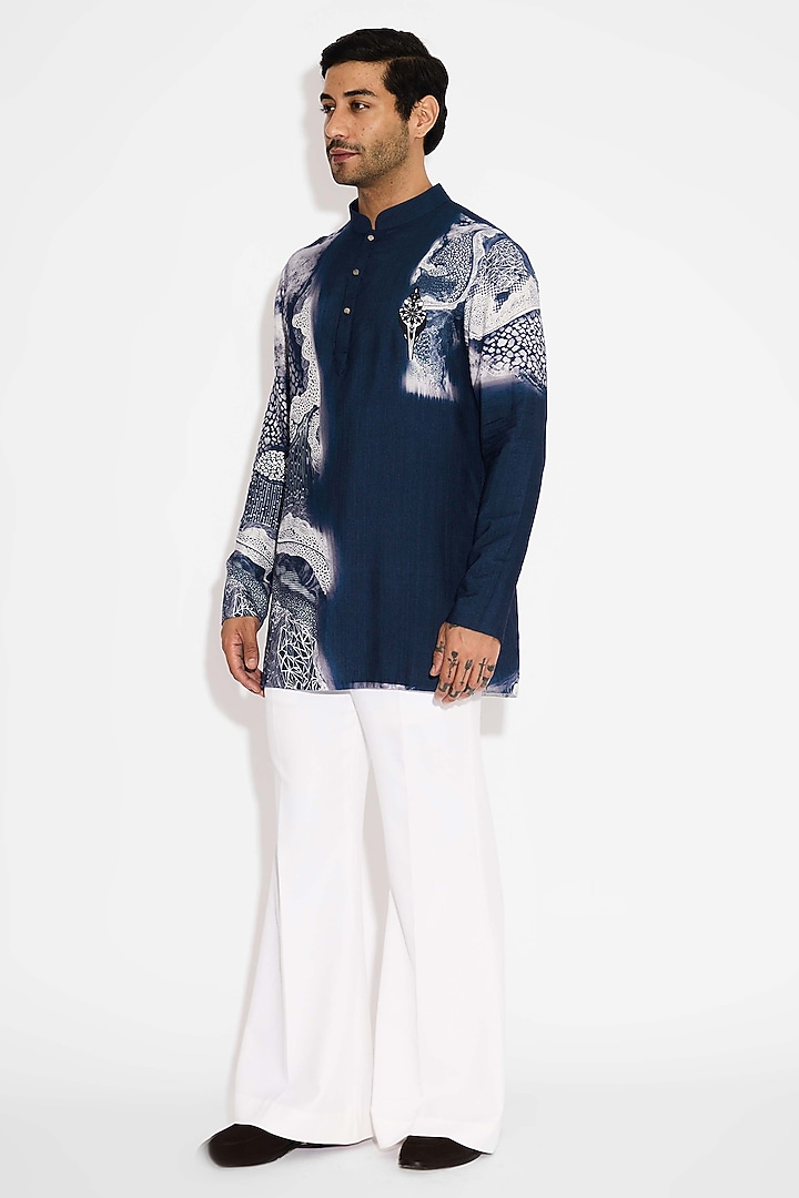 Ivory Banana Crepe Handcrafted Bell-Bottom Pant by SHASHA GABA MEN at Pernia's Pop Up Shop