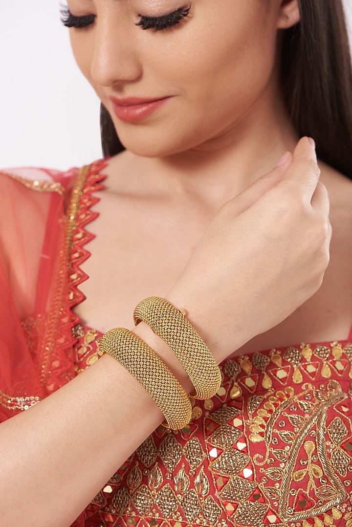 Gold Finish Temple Bangles (Set of 2) by Saga Jewels at Pernia's Pop Up Shop
