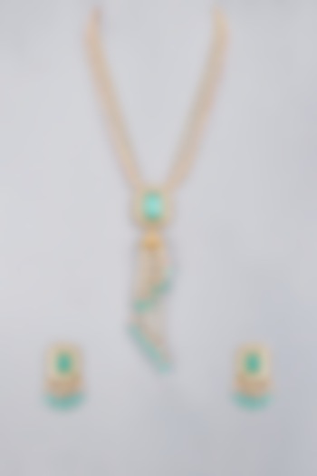 Gold Finish Necklace Set With Green Stones by Saga Jewels