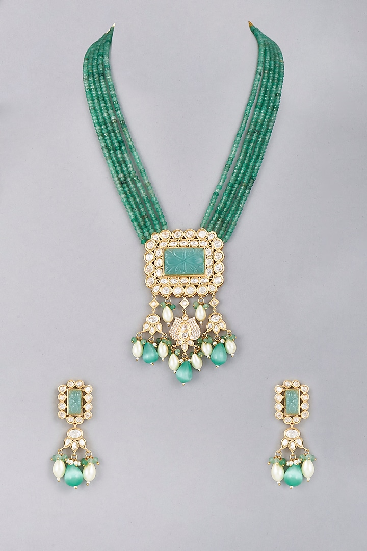 Gold Finish Faux Emerald Necklace Set by Saga Jewels at Pernia's Pop Up Shop